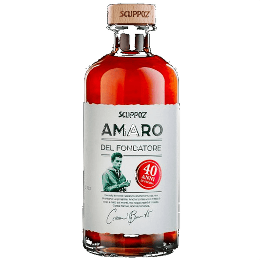 Un'edizione speciale del nostro celebre amaro. 

Una rivisitazione in occasione del quarantennale di Scuppoz.

Una miscela a base di erbe infuse in brandy invecchiato, in onore di Benito Cicconi: il fondatore.

Ingredienti: Acqua, alcol, brandy, zucchero, infuso di erbe, fiori, radici (Assenzio Romano, Rabarbaro, Calamo, Menta, Genziana, China, Camomilla...)